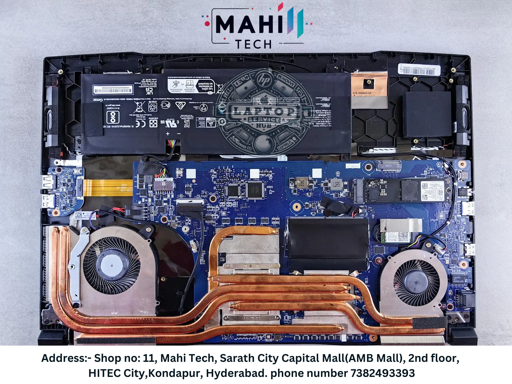 Laptop open with internal components visible